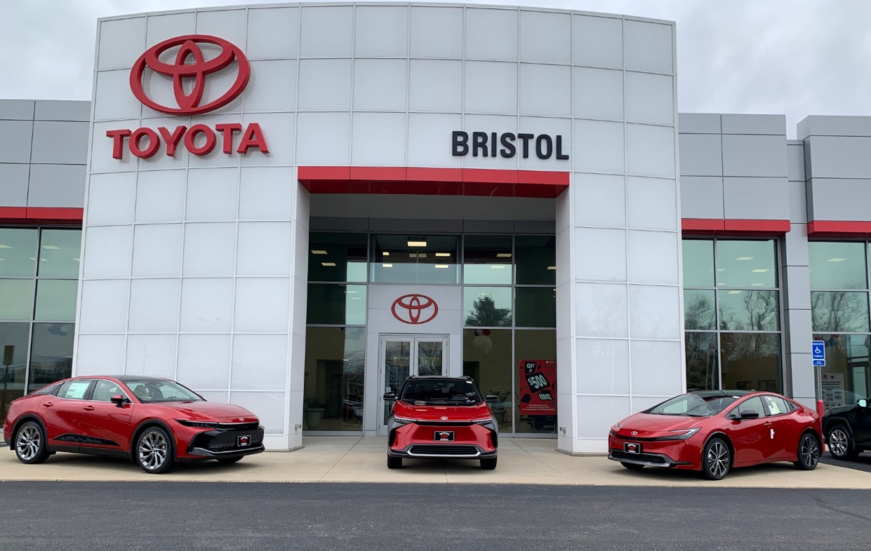 Toyota of Bristol dealership entrance with Toyota vehicles outside